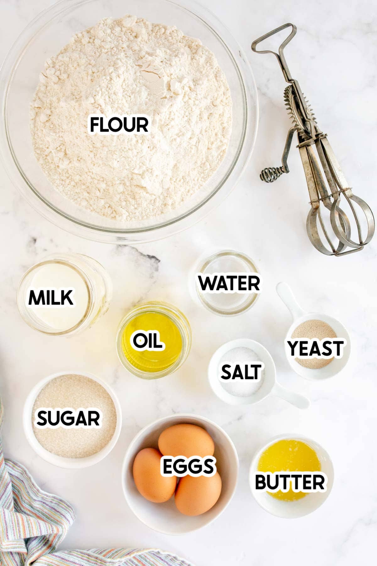 Ingredients needed for homemade crescent rolls with labels