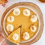 No bake pumpkin pie topped with whipped cream and cinnamon