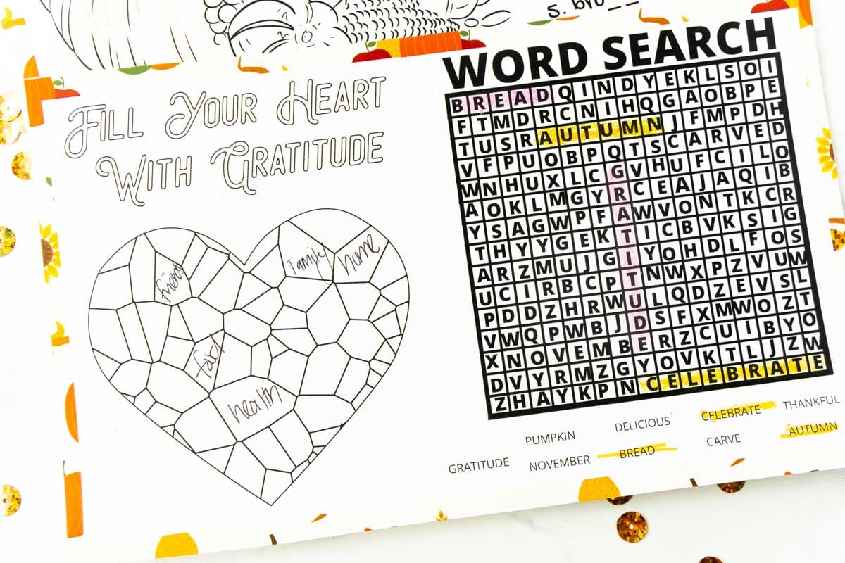 Thanksgiving placemat with a word search and heart on it