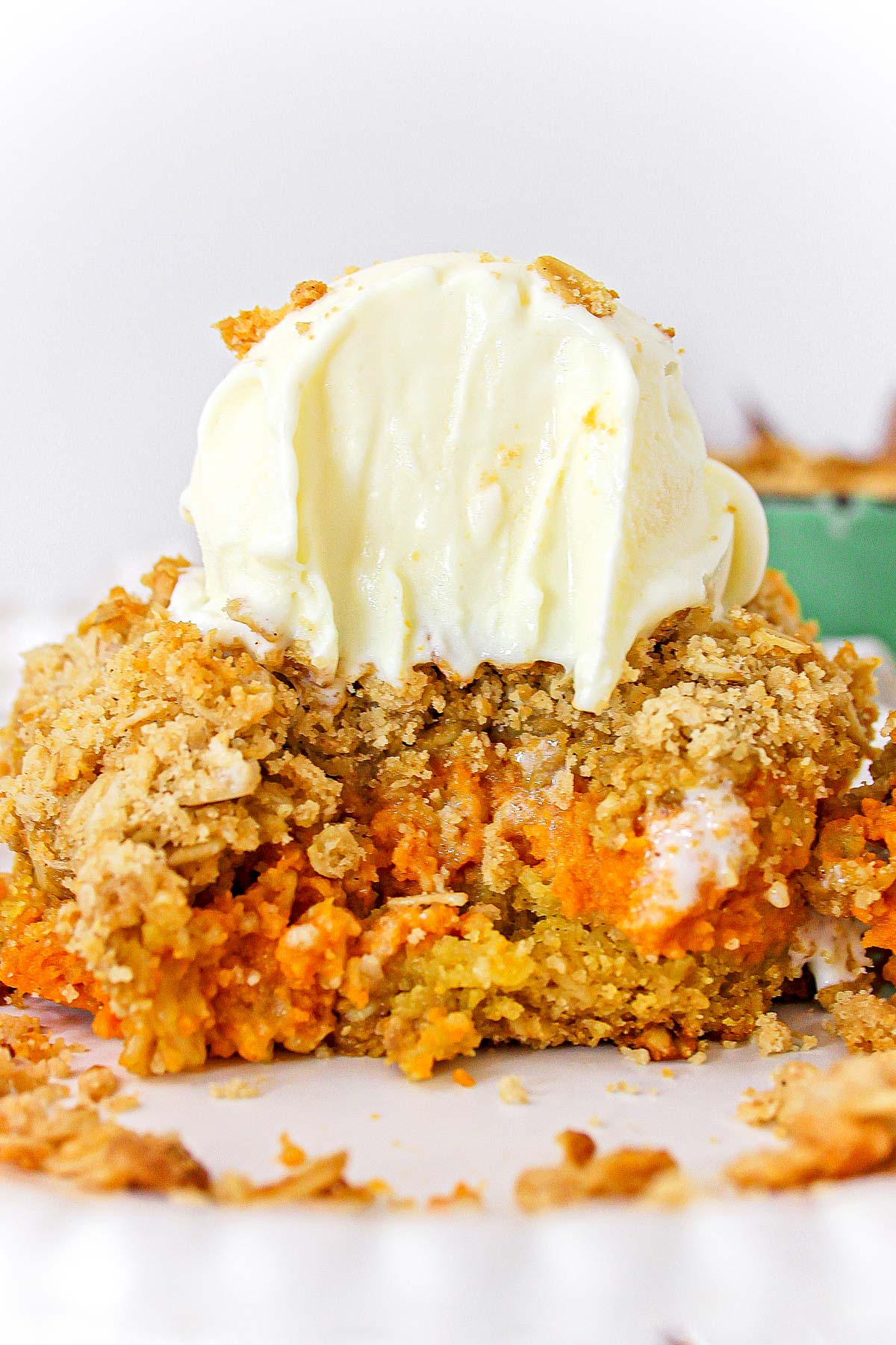 Maple pumpkin crisp with a scoop of vanilla ice cream on top