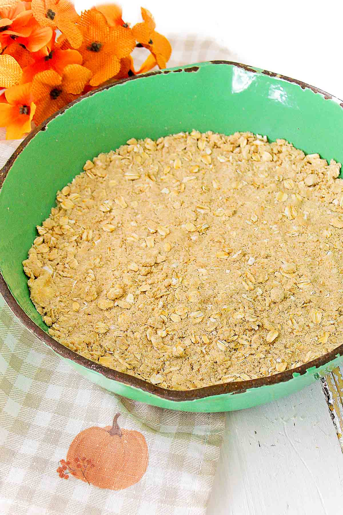 Cast iron skillet with pumpkin crisp topping