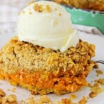 Piece of pumpkin crisp with ice cream on top