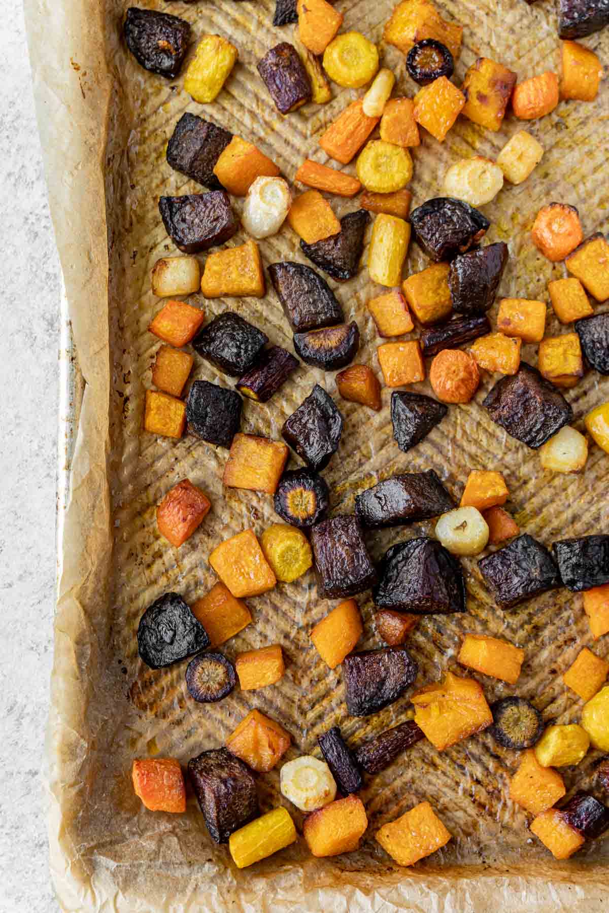 A sheet pan full of roasted root vegetables
