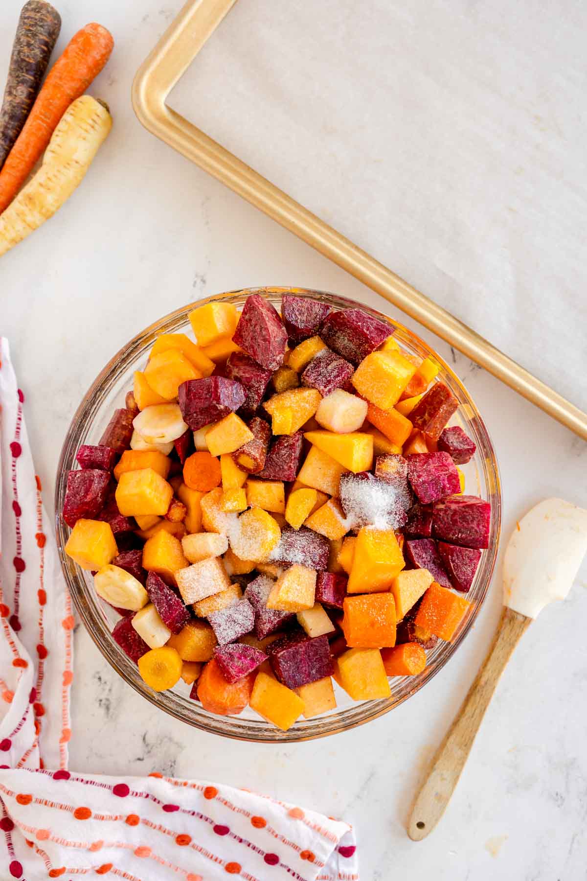 glass bowl with chopped root vegetables