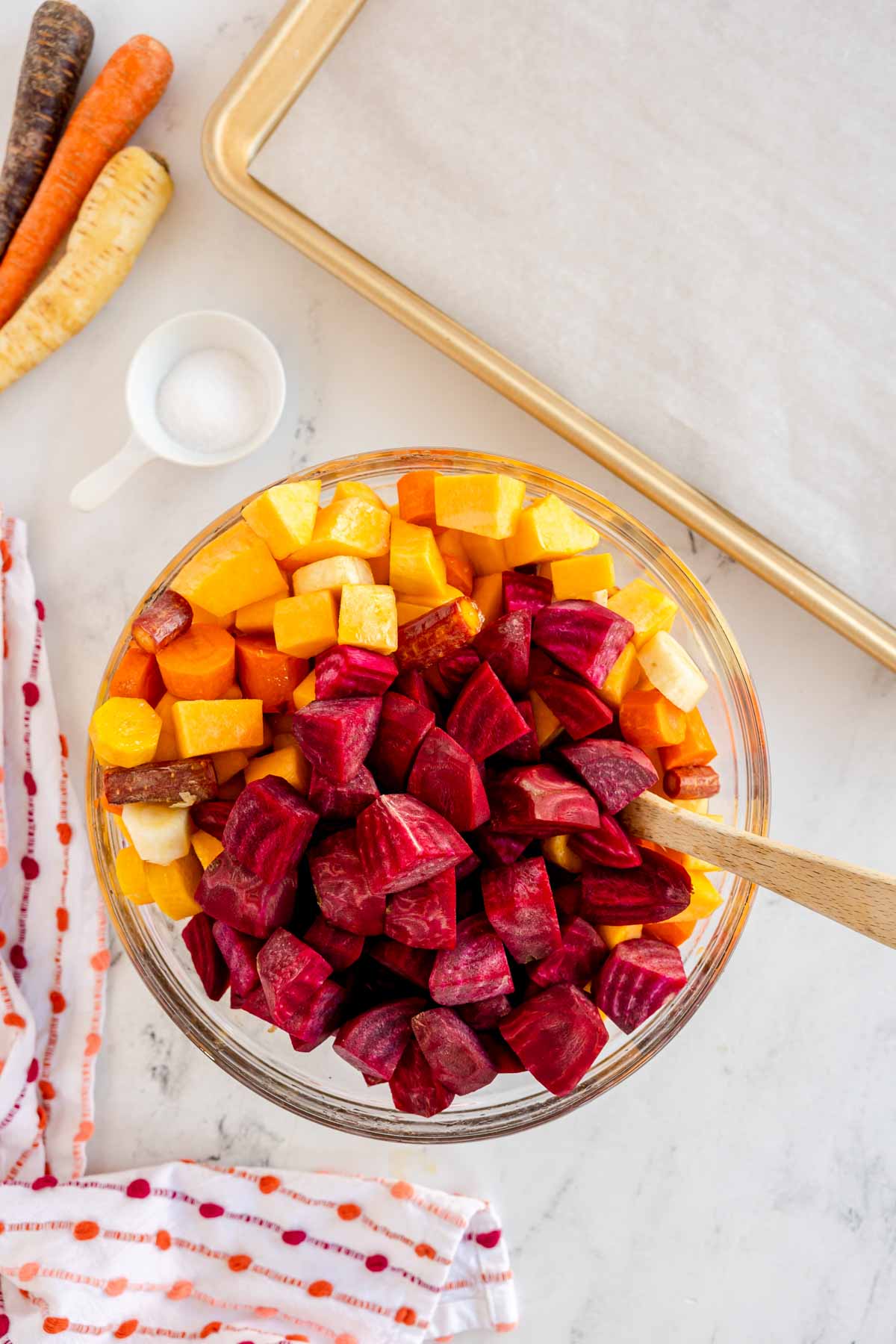 glass bowl with chopped root vegetables