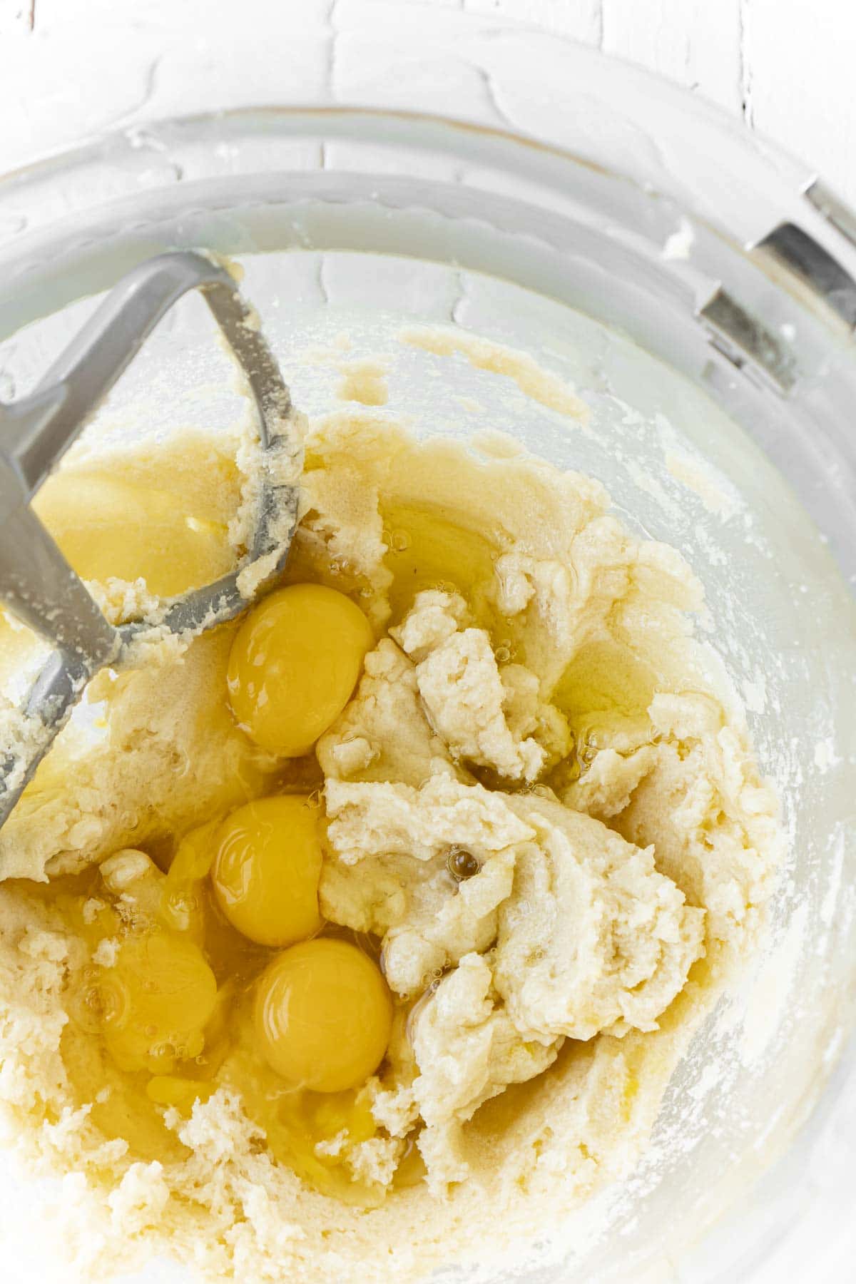 Mixing bowl with butter and sugars creamed together