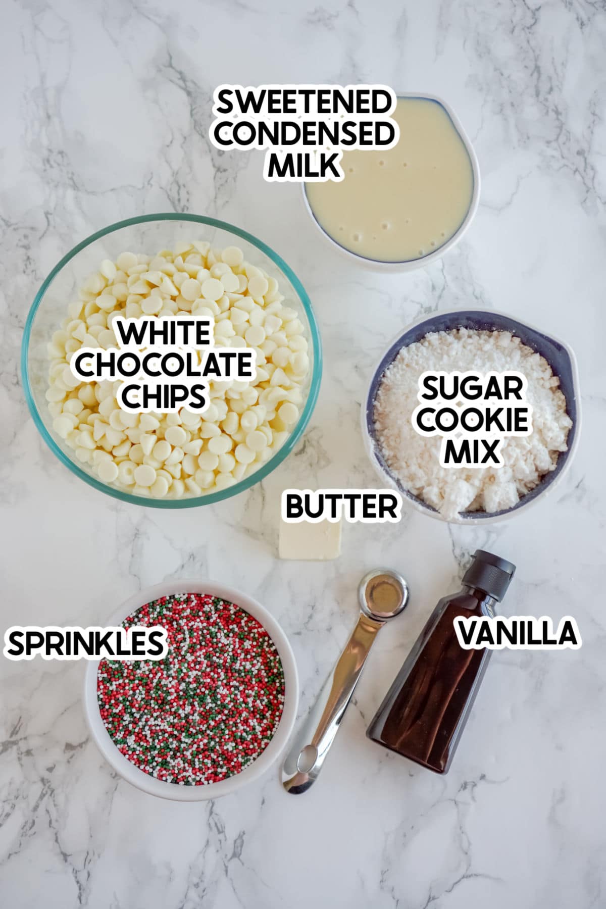 Ingredients to make sugar cookie dough fudge with labels