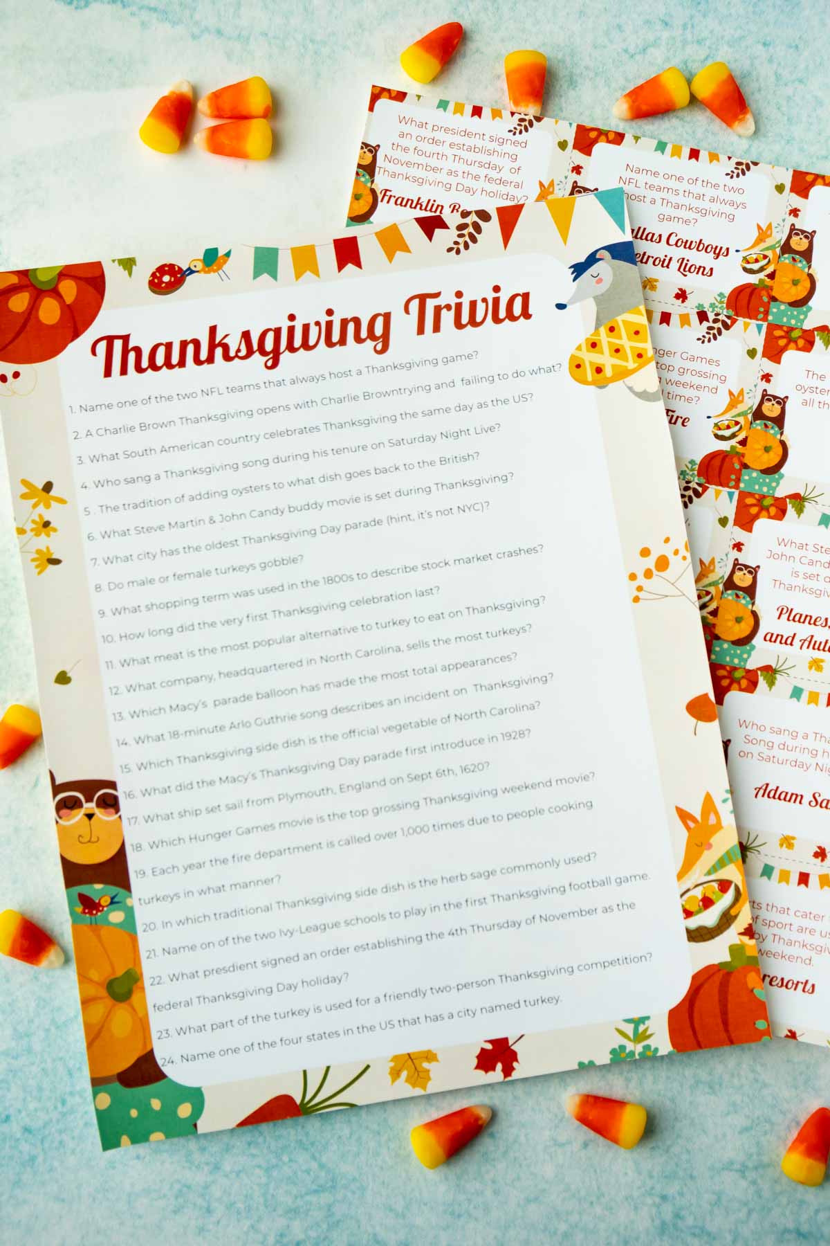 A list of Thanksgiving trivia questions on top of trivia cards