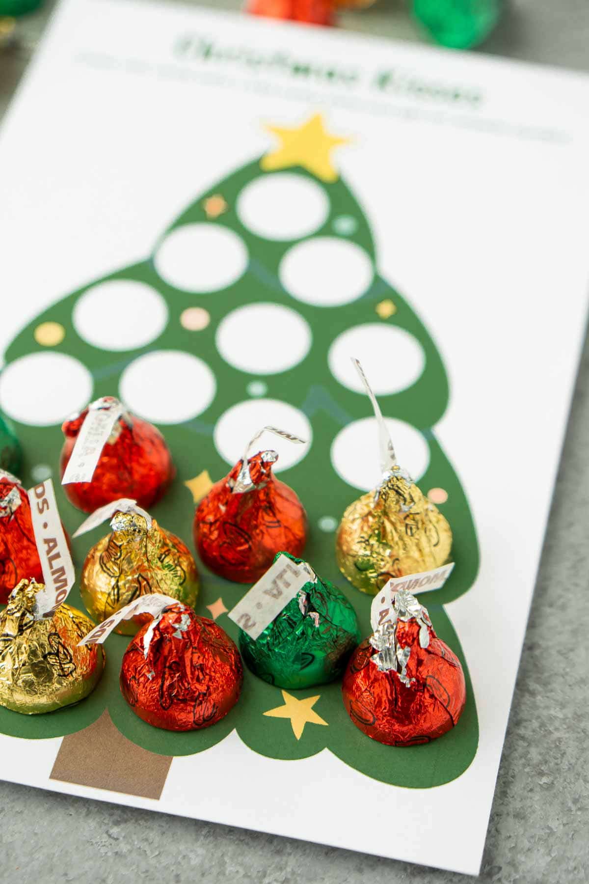 Christmas tree printable half covered with Hershey's kisses