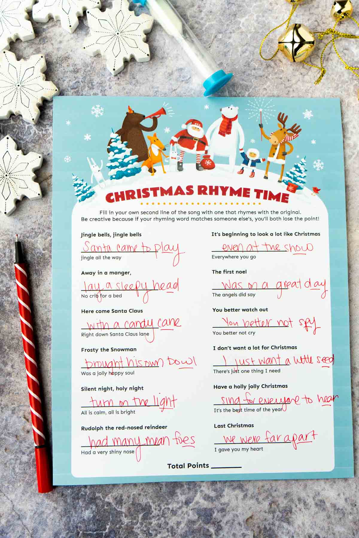 Christmas rhyme game with lyrics written on it