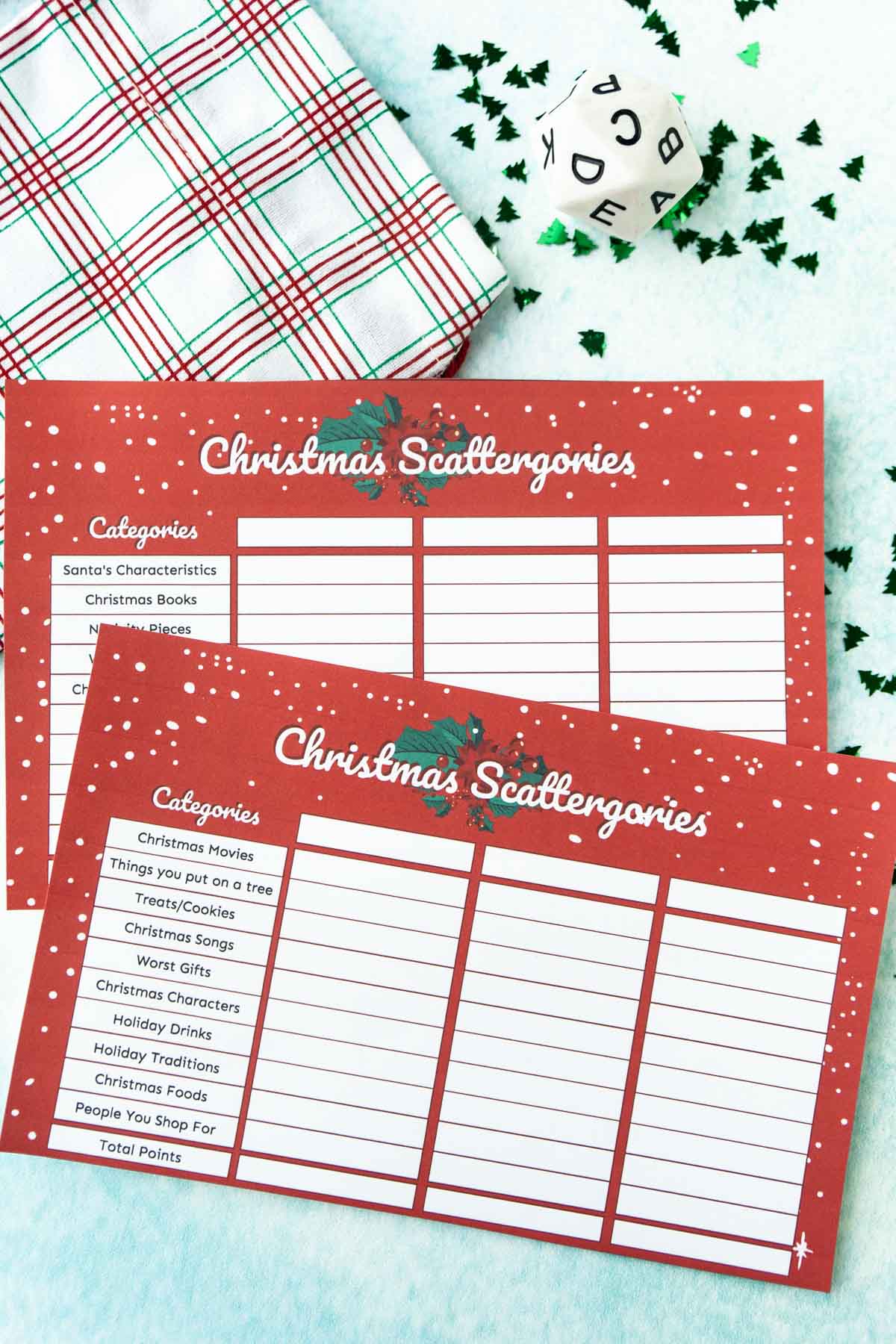 Two Christmas scattergories cards on top of each other