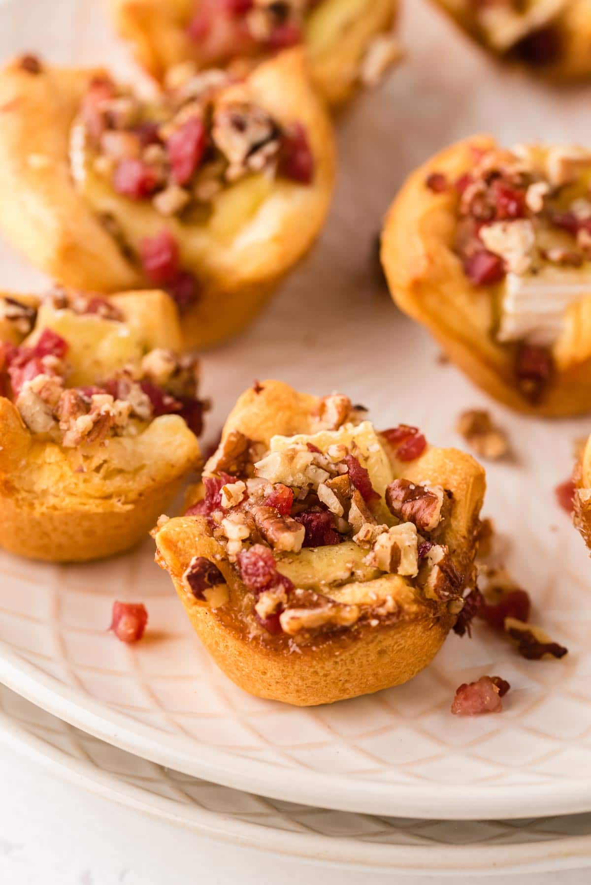 Bacon brie bites on a plate