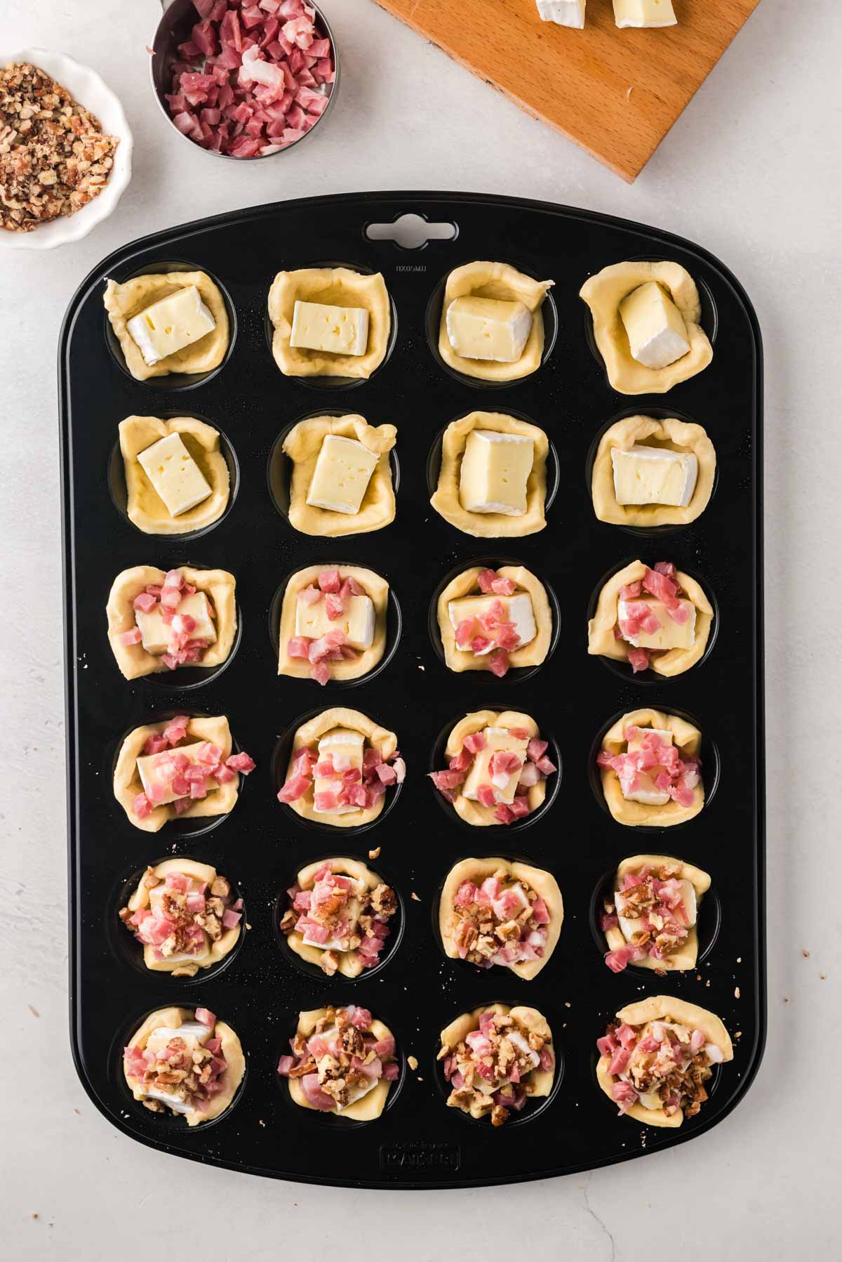 Brie and bacon in mini muffin tins