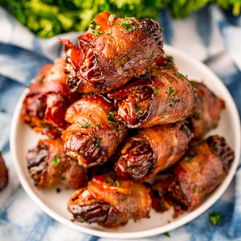 White plate with bacon wrapped dates