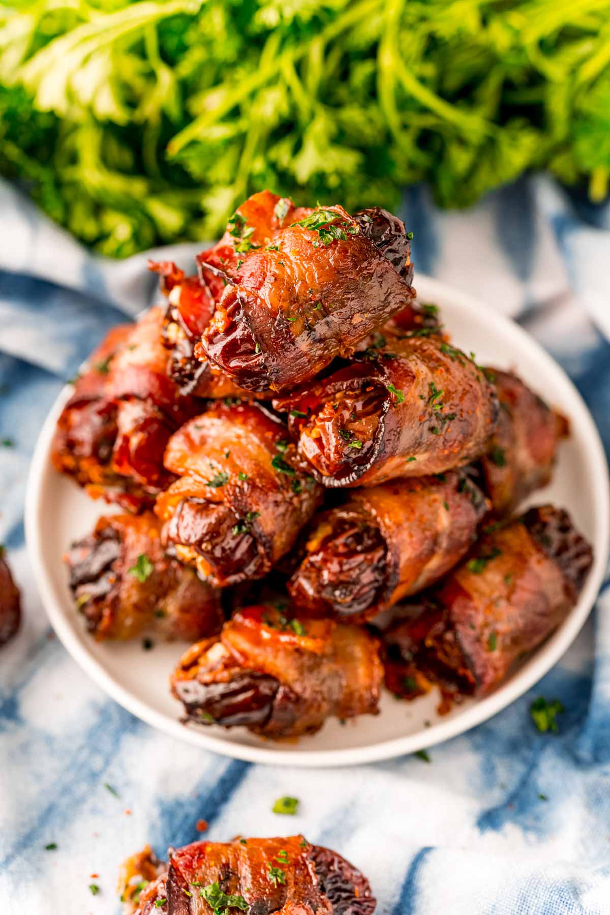 White plate with bacon wrapped dates