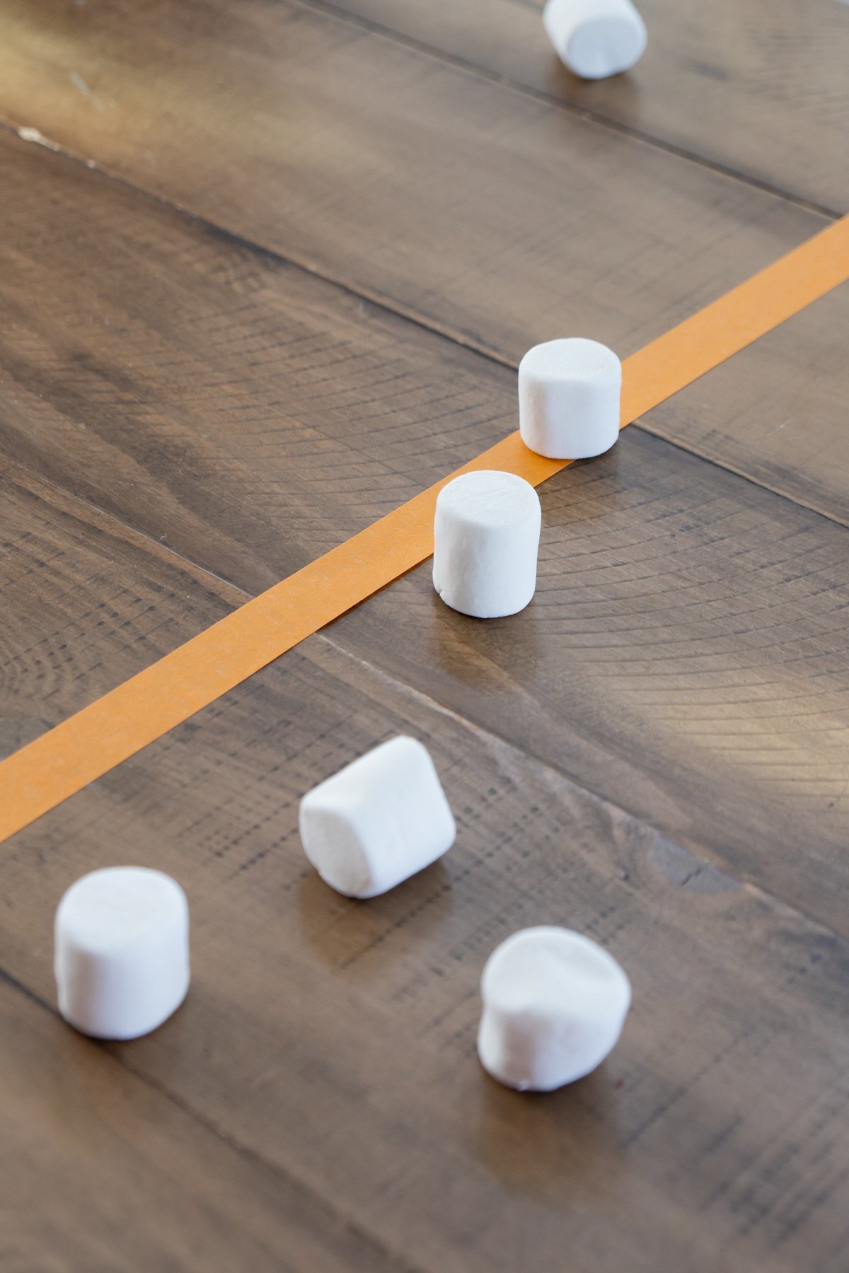 Marshmallows on a table with tape