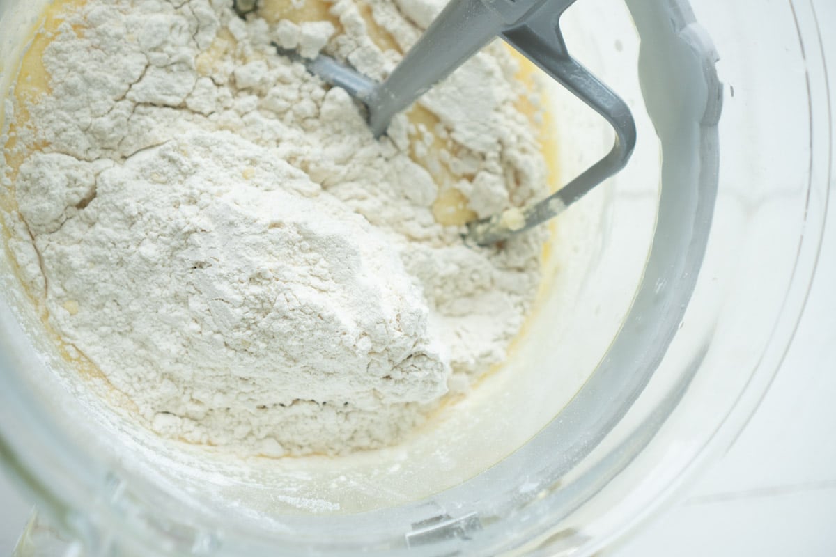 Dry ingredients added to a mixing bowl