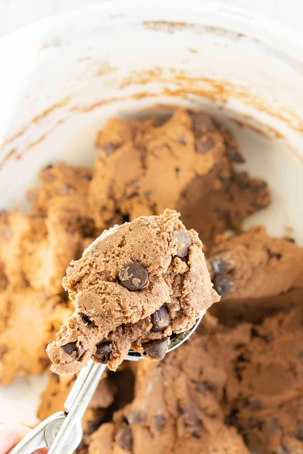 chocolate chip pudding cookie dough in a cookie scoop
