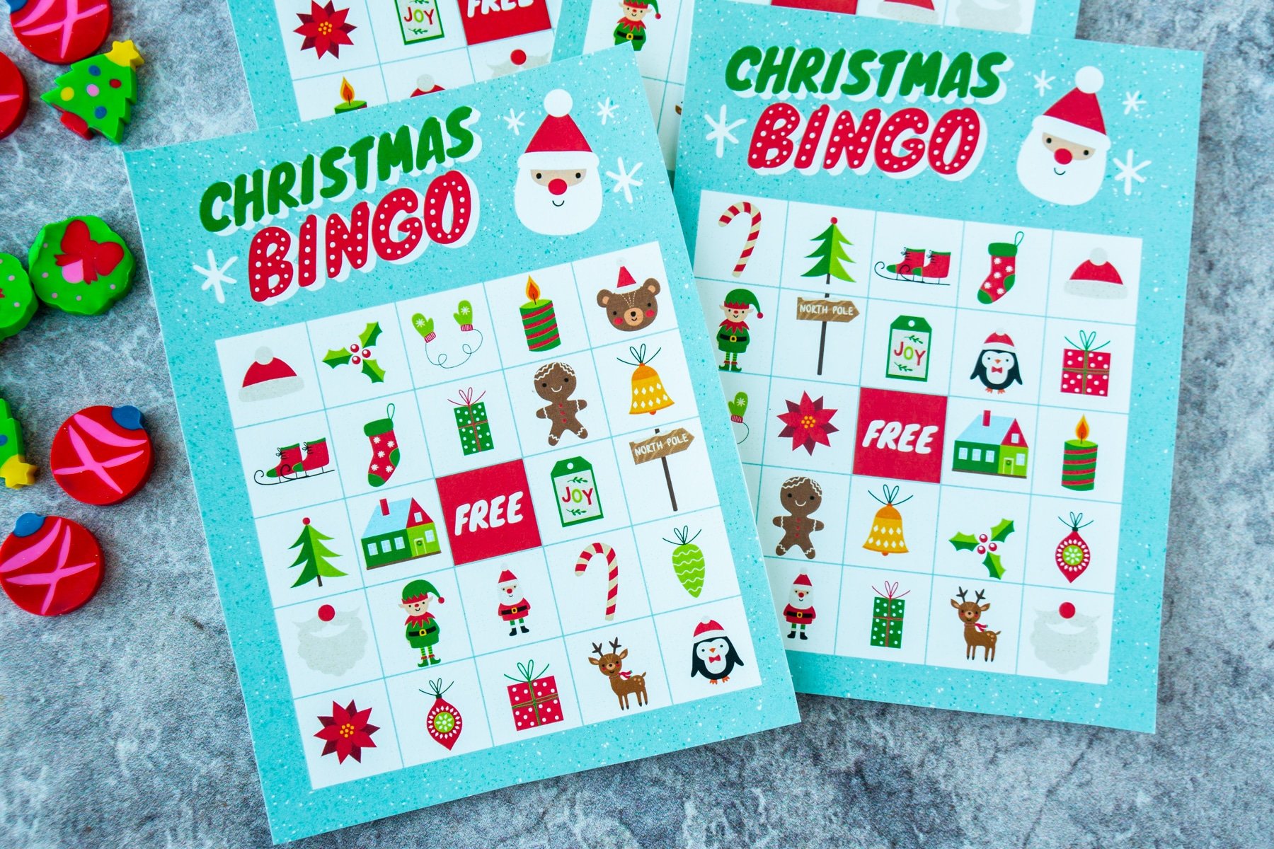 Horizontal image of two blank Christmas bingo cards