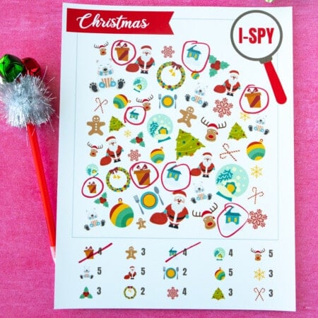 Christmas i-spy game with a pen with jingle bells