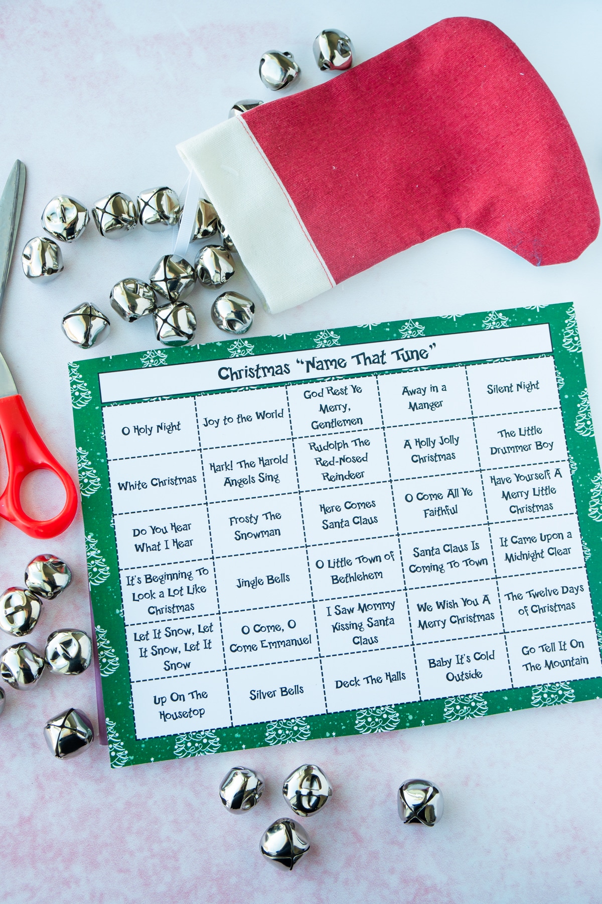Christmas name that tune cards with scissors and bells