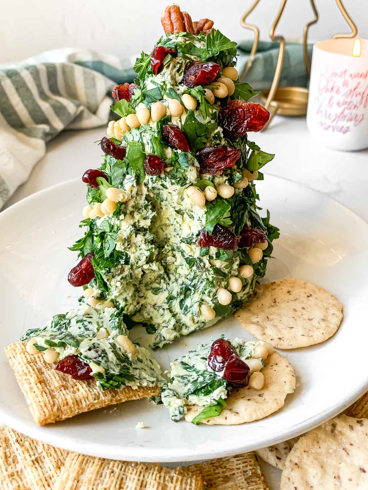 Christmas tree cheese ball with a bite taken out of it