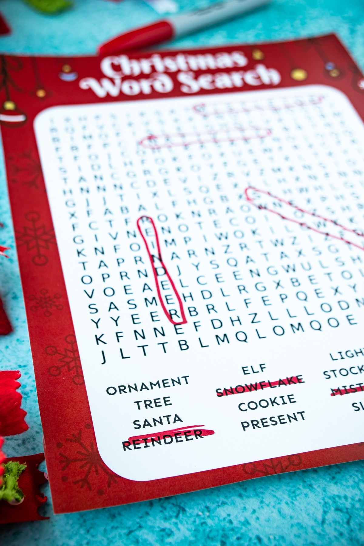 Christmas word search with words crossed out