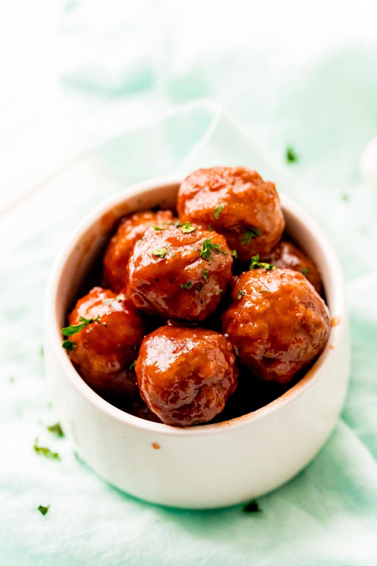 Small bowl with grape jelly meatballs