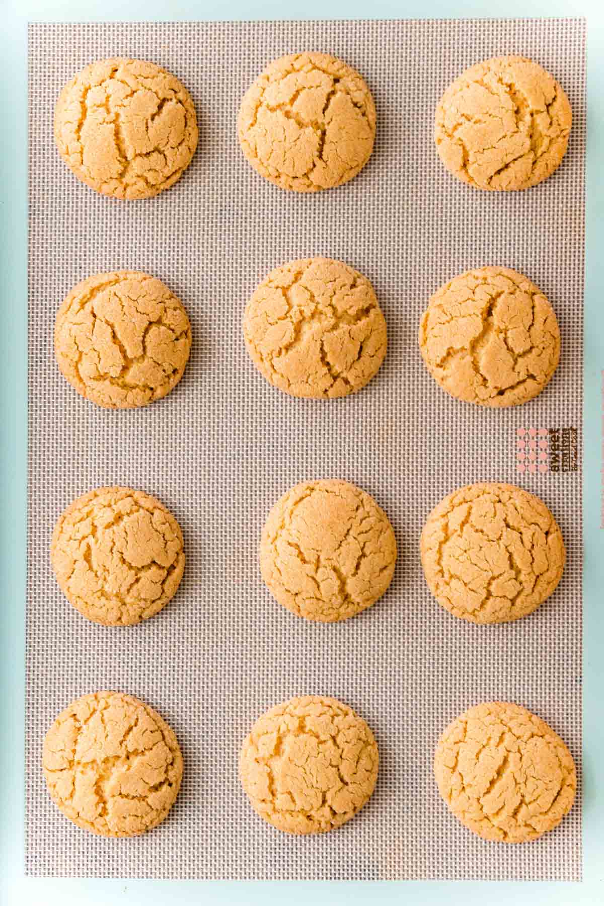 Peanut butter blossoms on a baking sheet