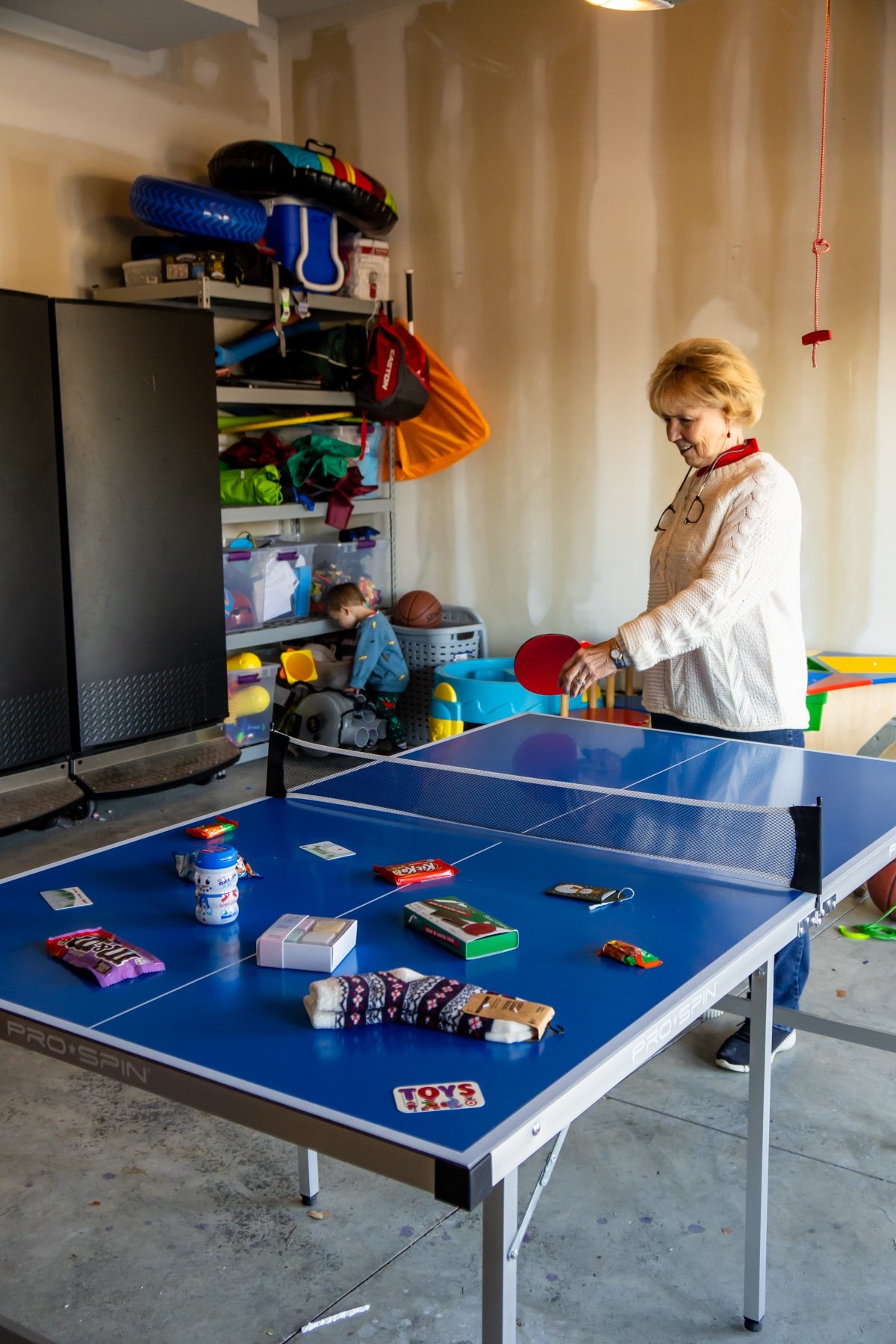 Grandma hitting a ping pong ball