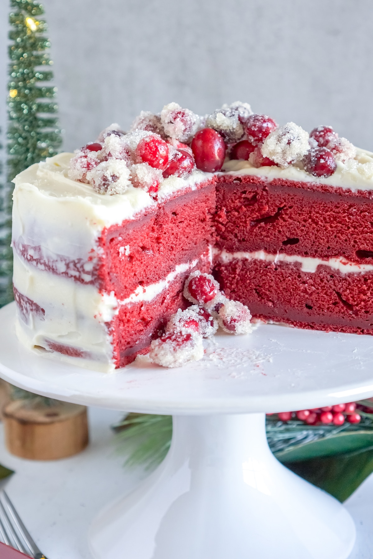 red velvet cake on a white stand