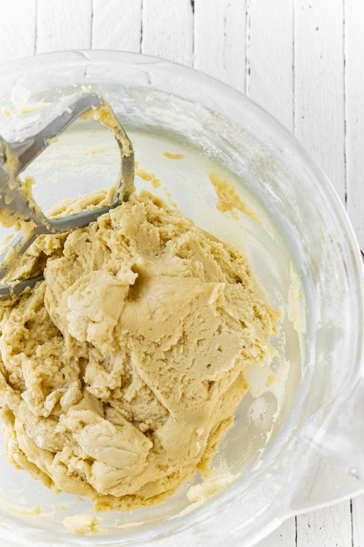 Glass mixing bowl with rolo cookies dough