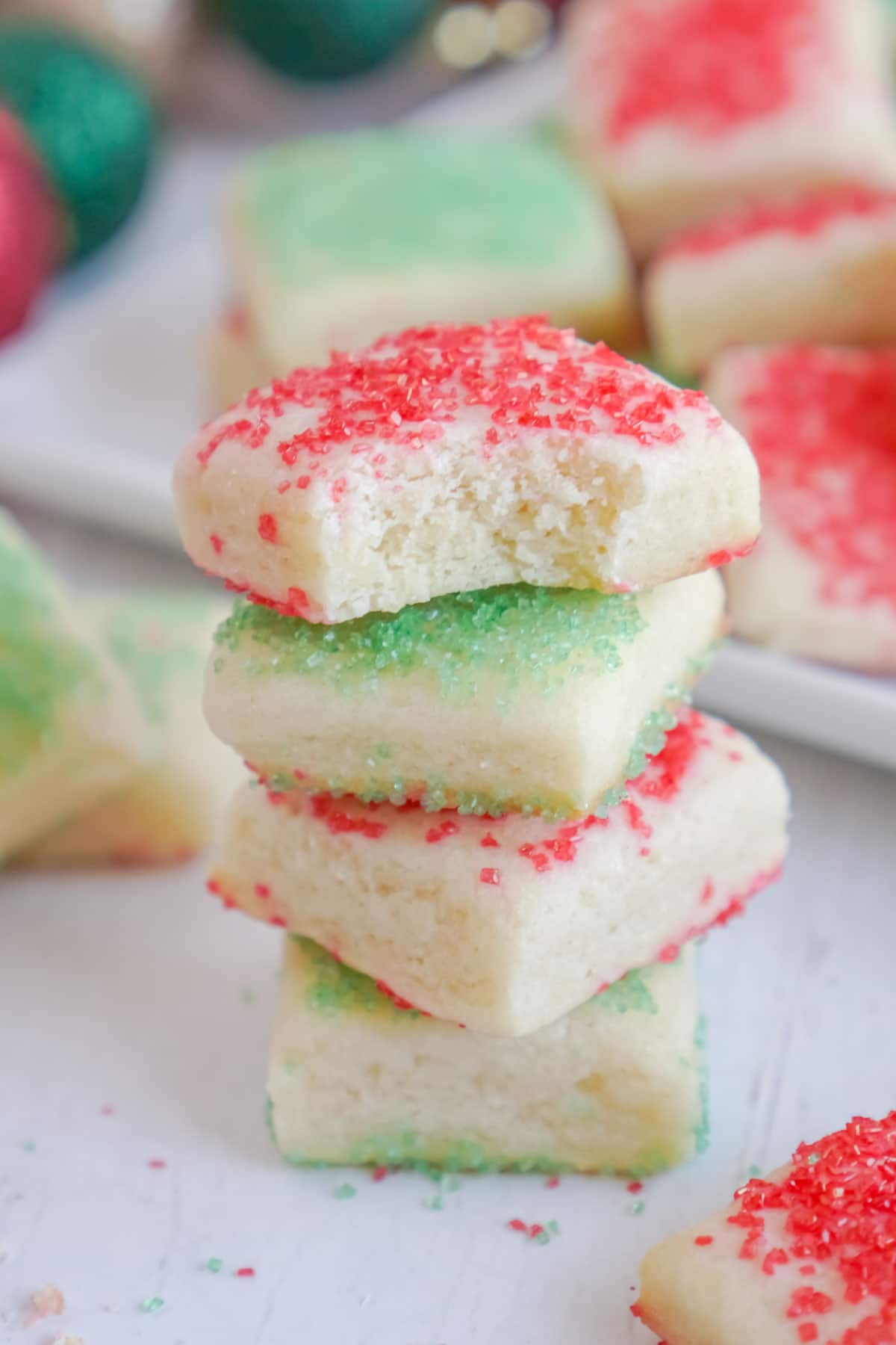 Stack of sugar cookie bites with Christmas sprinkles
