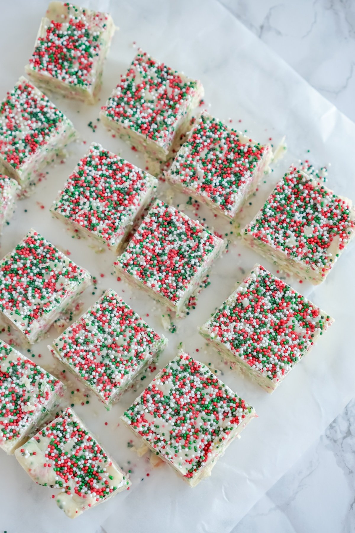 White chocolate fudge with sprinkles cut into squares