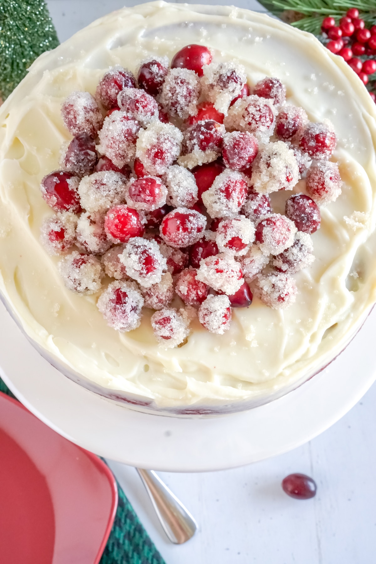 Cake with sugared cranberries on top