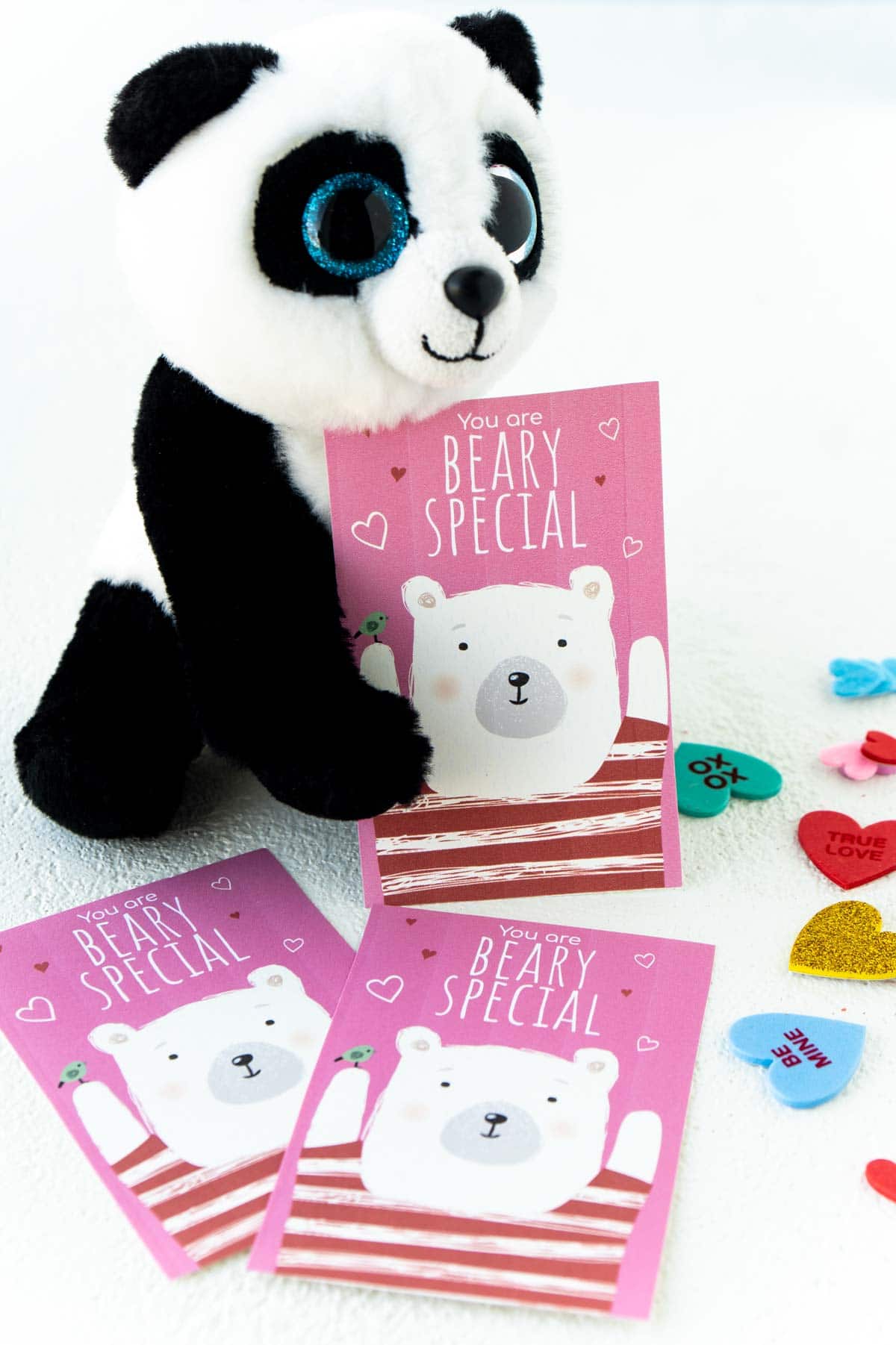 Bear valentine with a stuffed panda bear