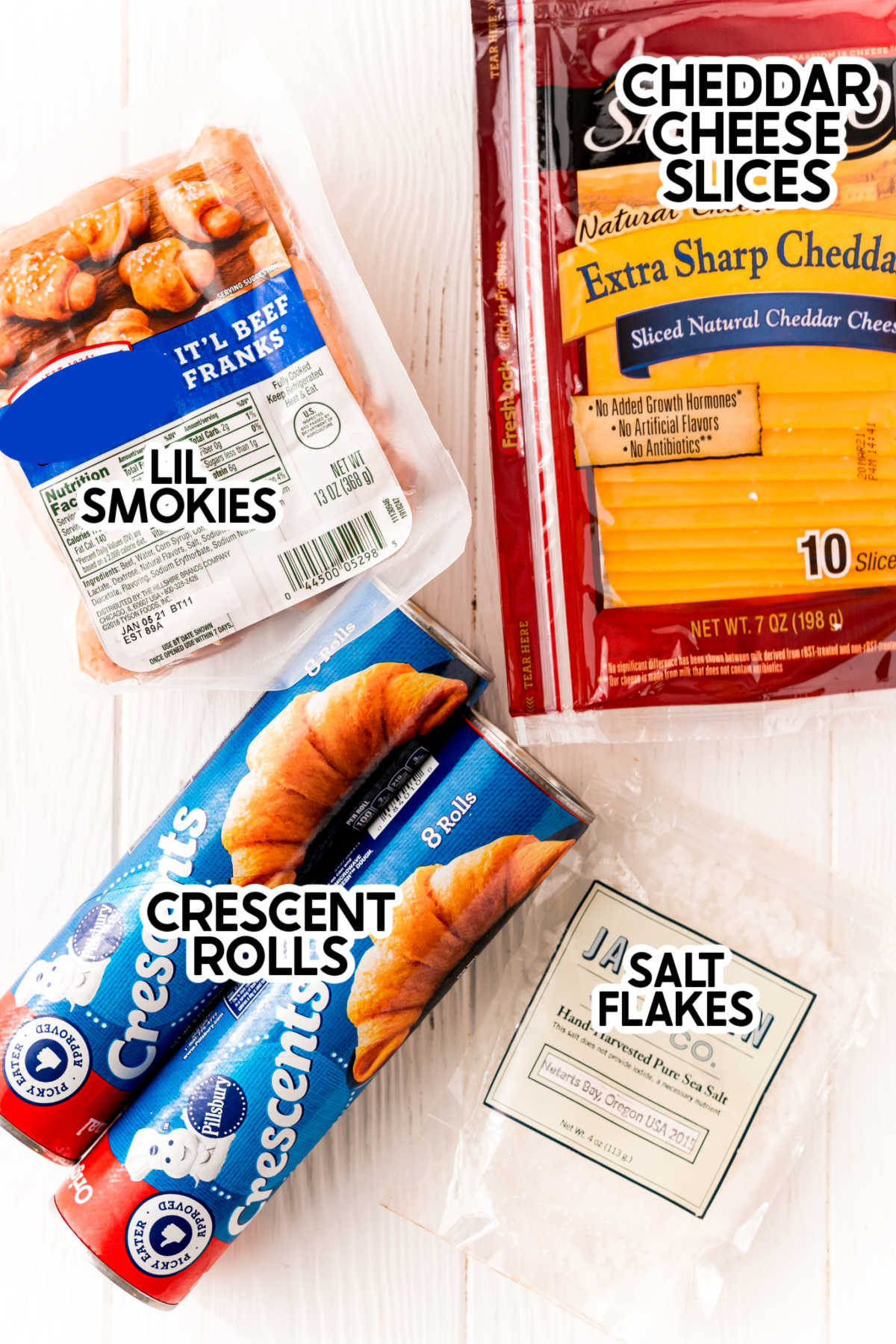Ingredients for cheddar pigs in a blanket with labels
