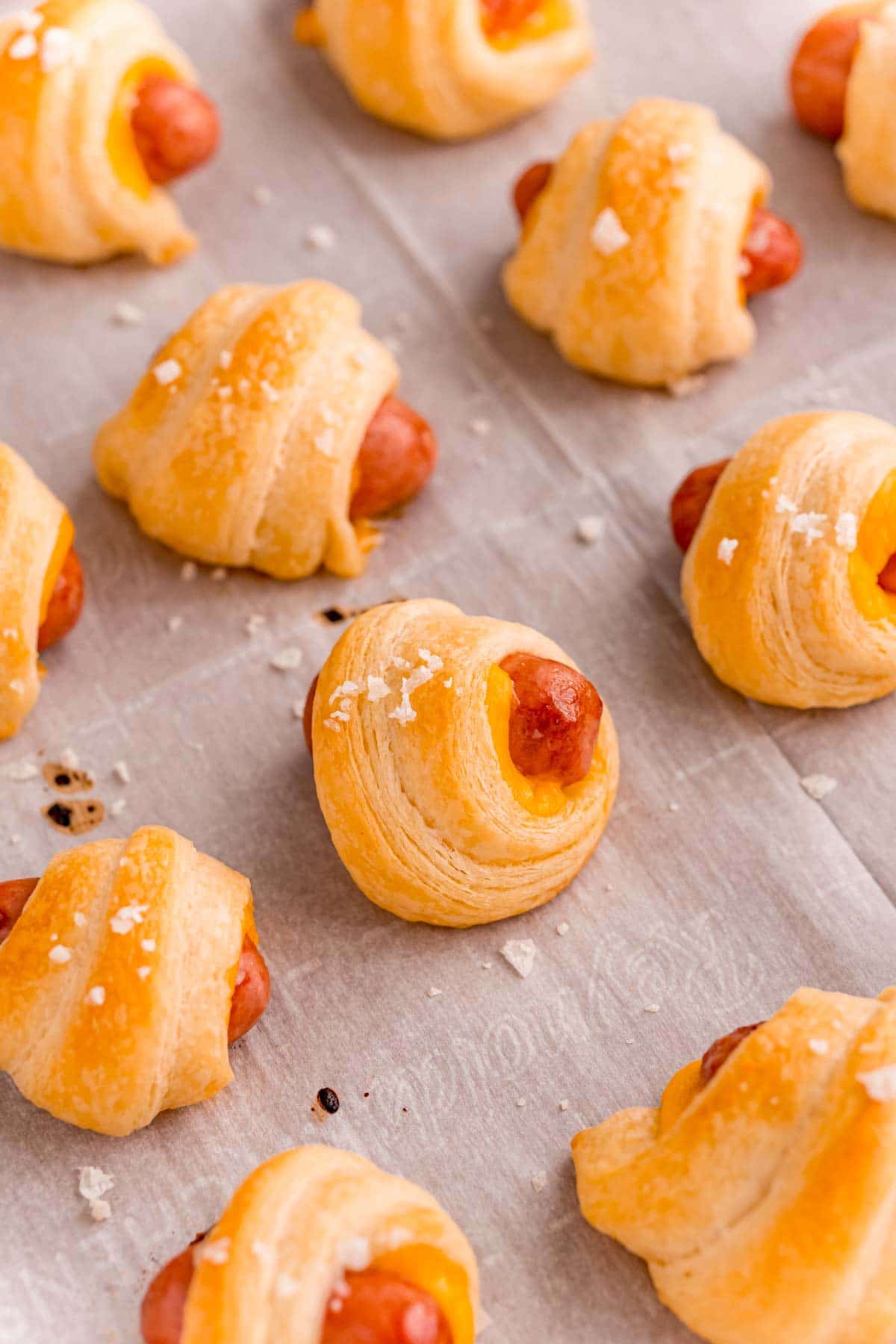 Cheddar pigs in a blanket with flake salt