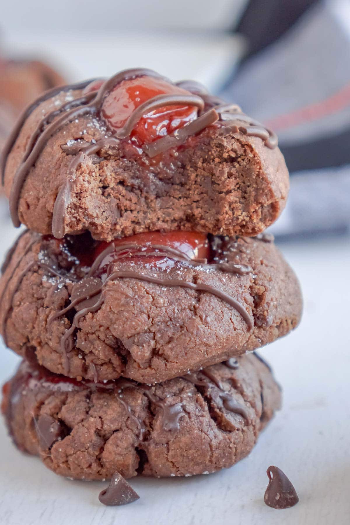 Stack of chocolate thumbprint cookies