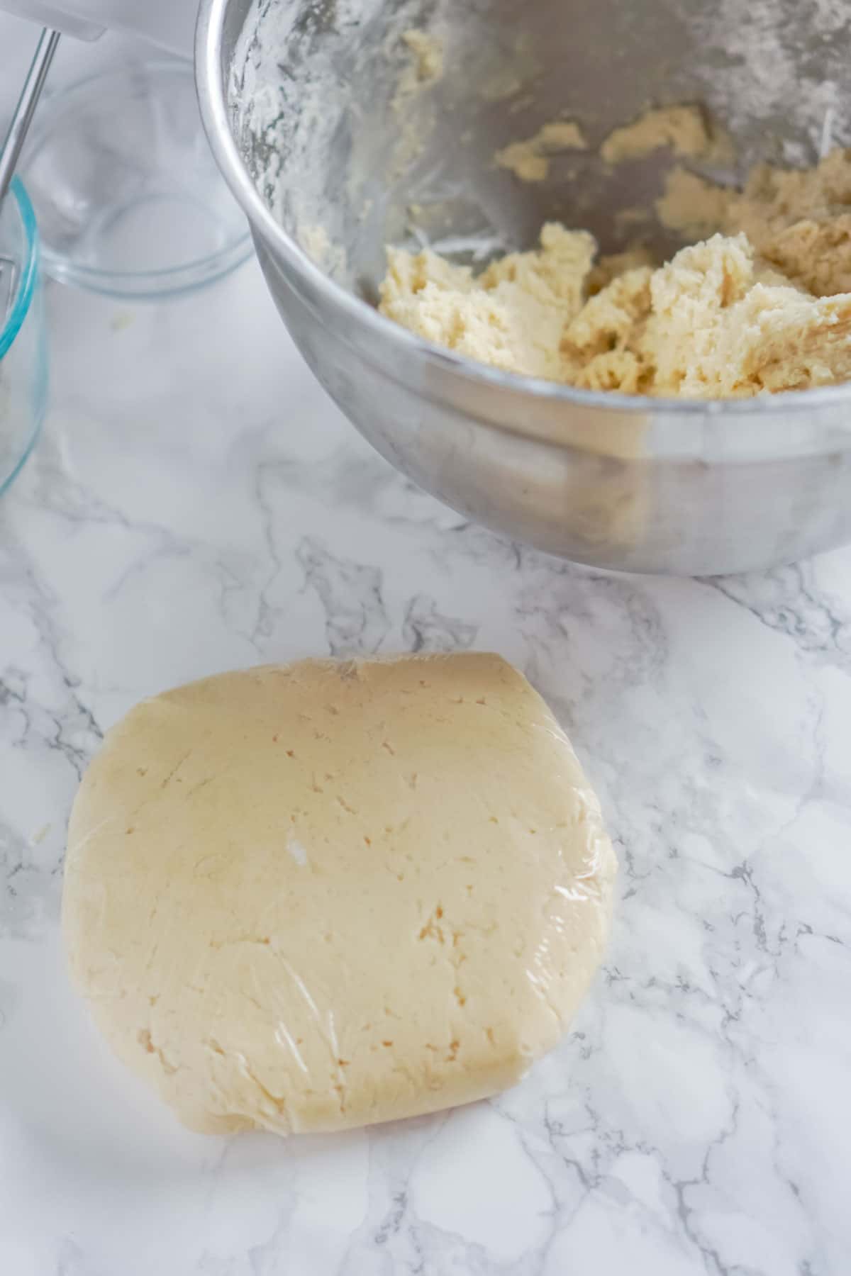 Bowl of cookie dough for cream cheese sugar cookies