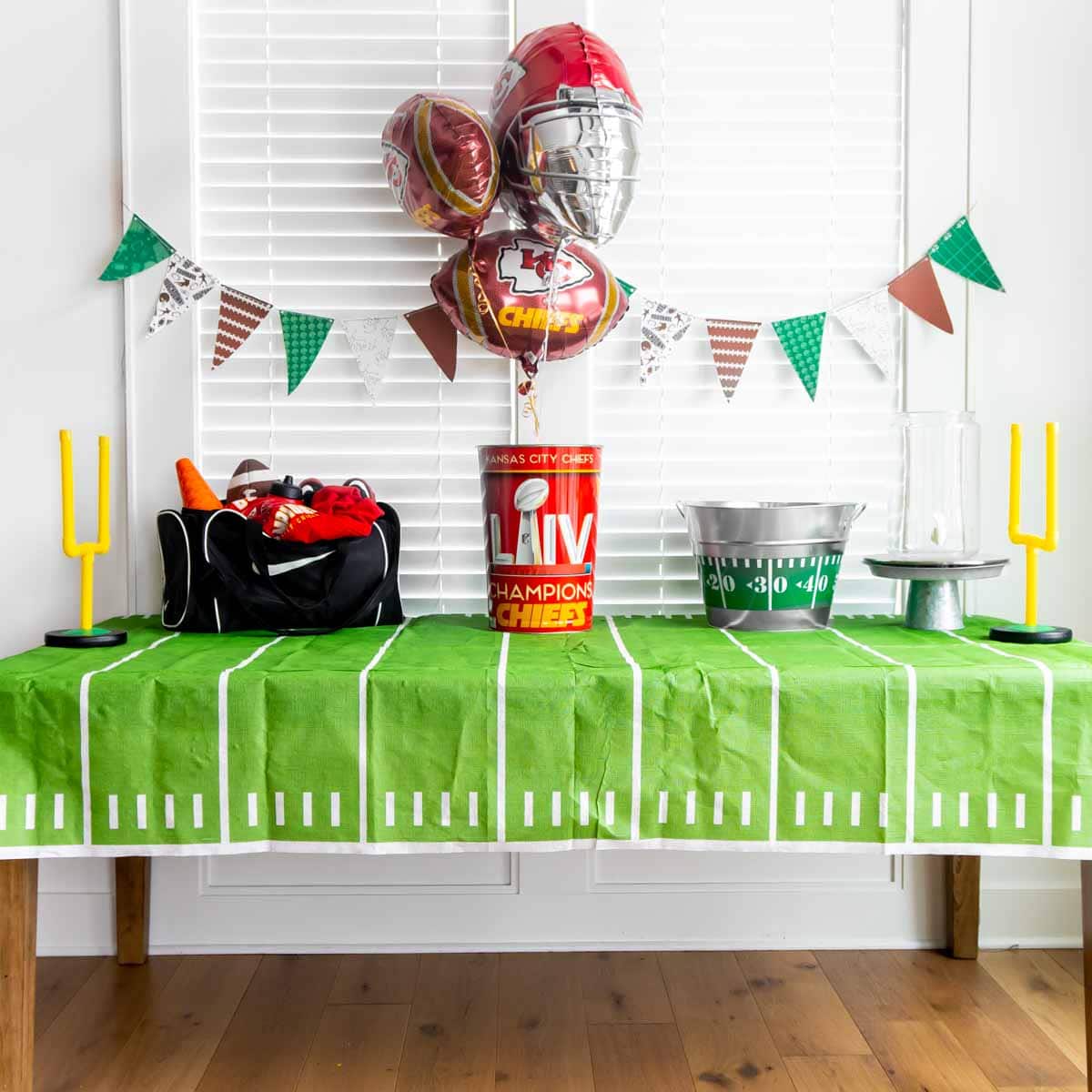 Football party table with large items on it