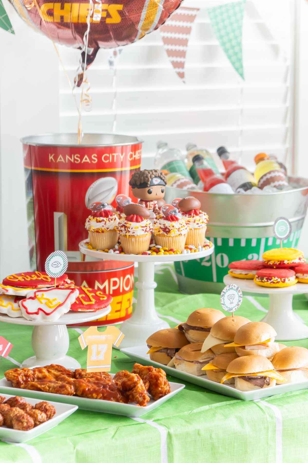 Super Bowl table with Chiefs decorations and food