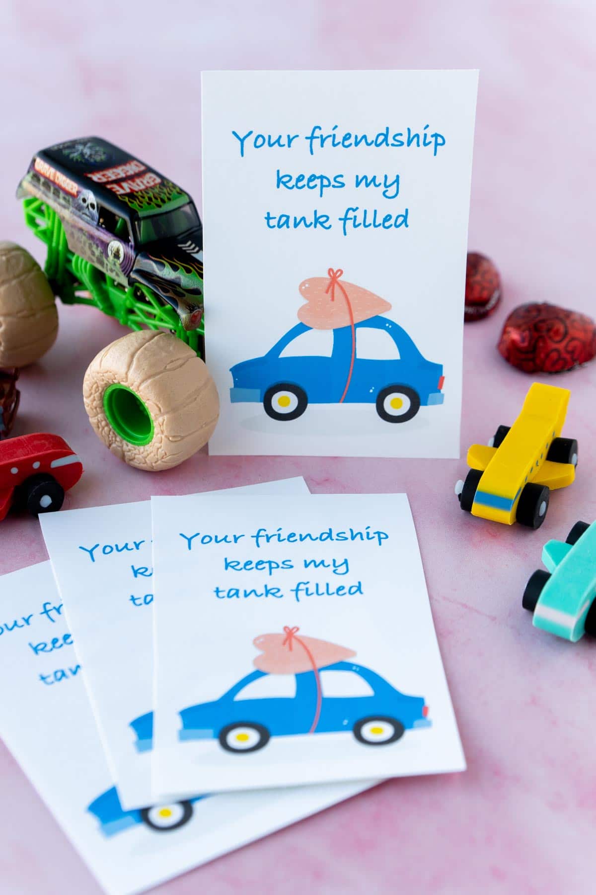 Printed out car valentine with toy cars around