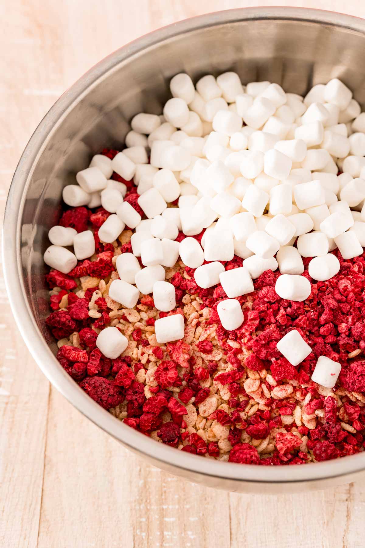 Pot with rice krispies, raspberries, and marshmallows