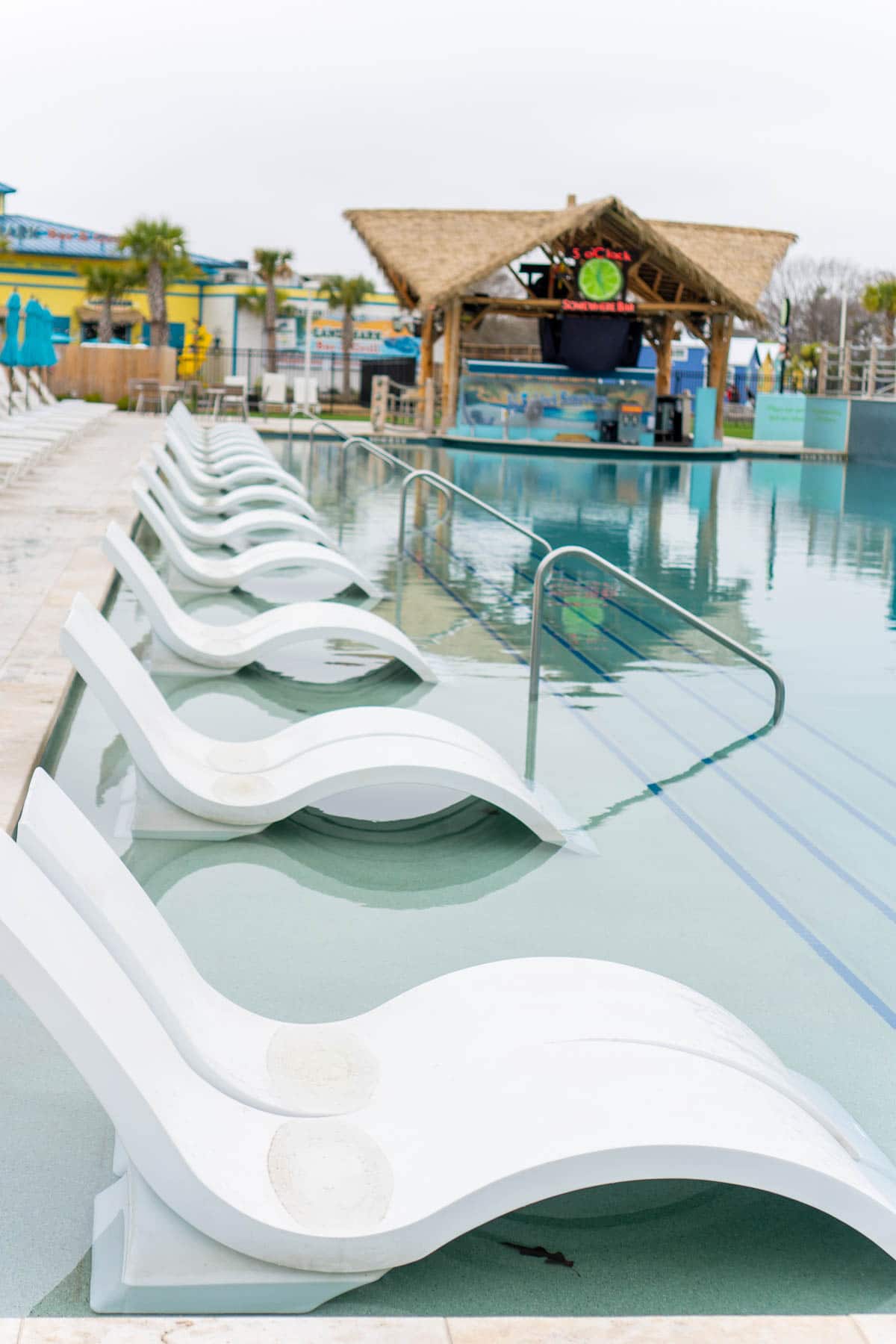 Chairs by a pool at Margaritaville Lake Conroe