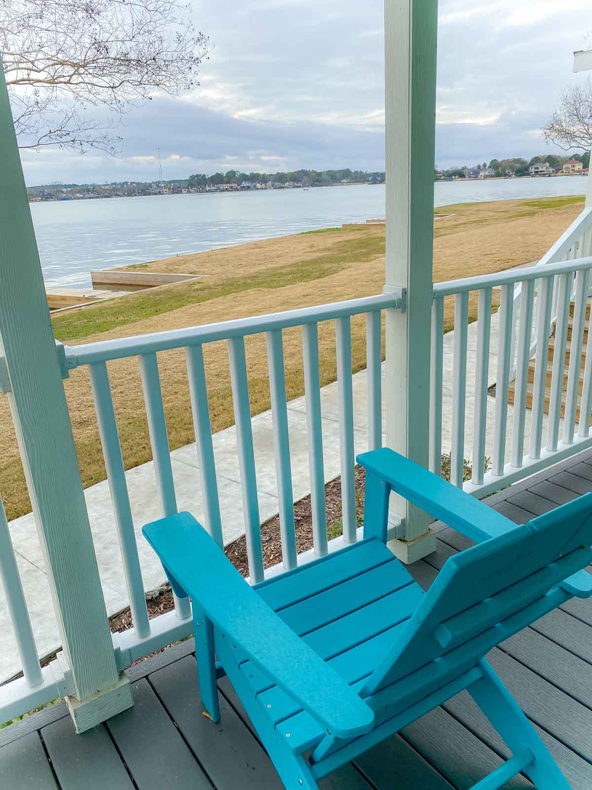 Chair on a porch by a lake