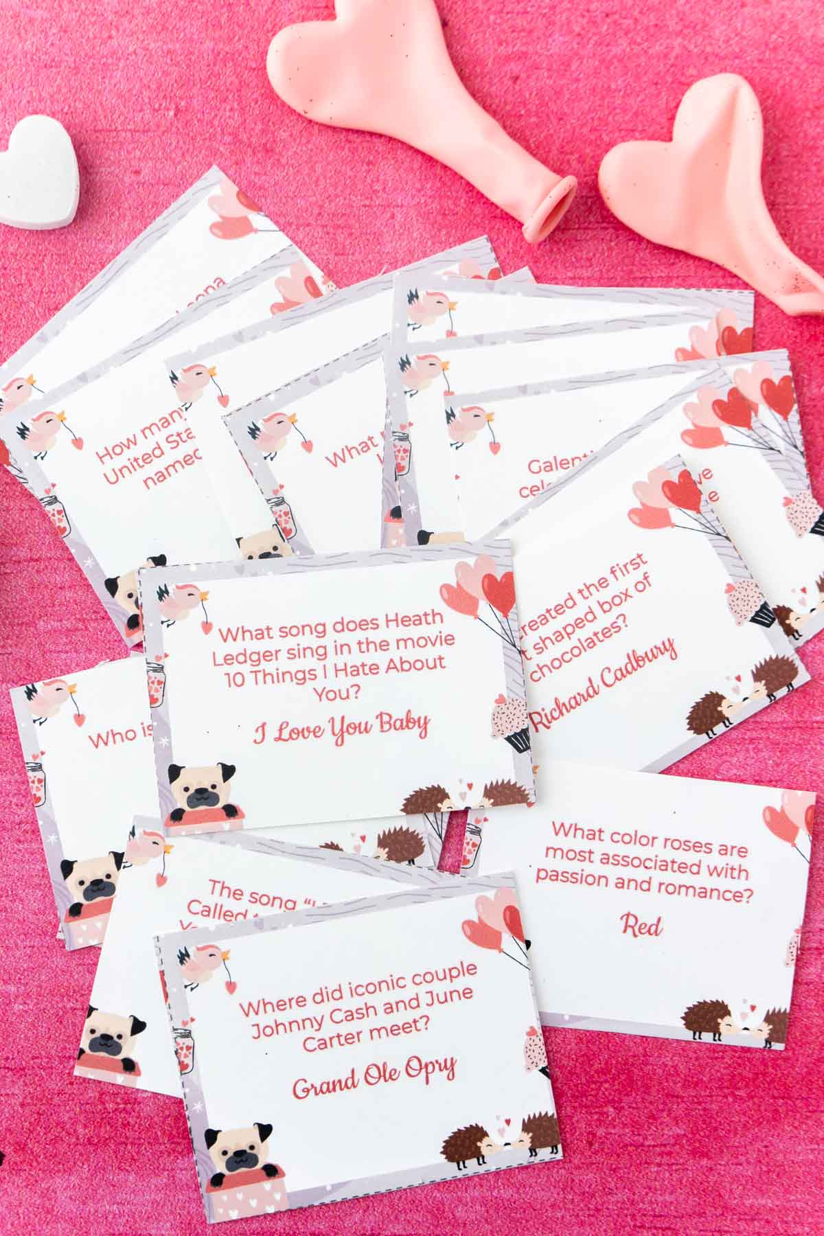 Valentines trivia cards in a pile