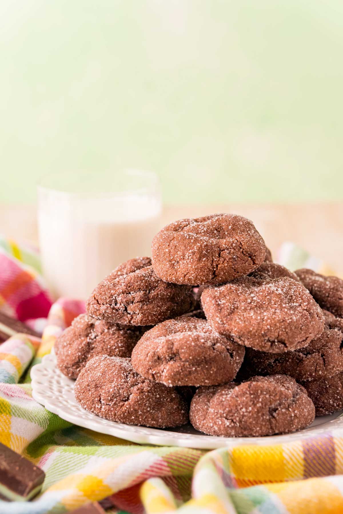 Plate of Andes mint cookies with a glass of milk in the background