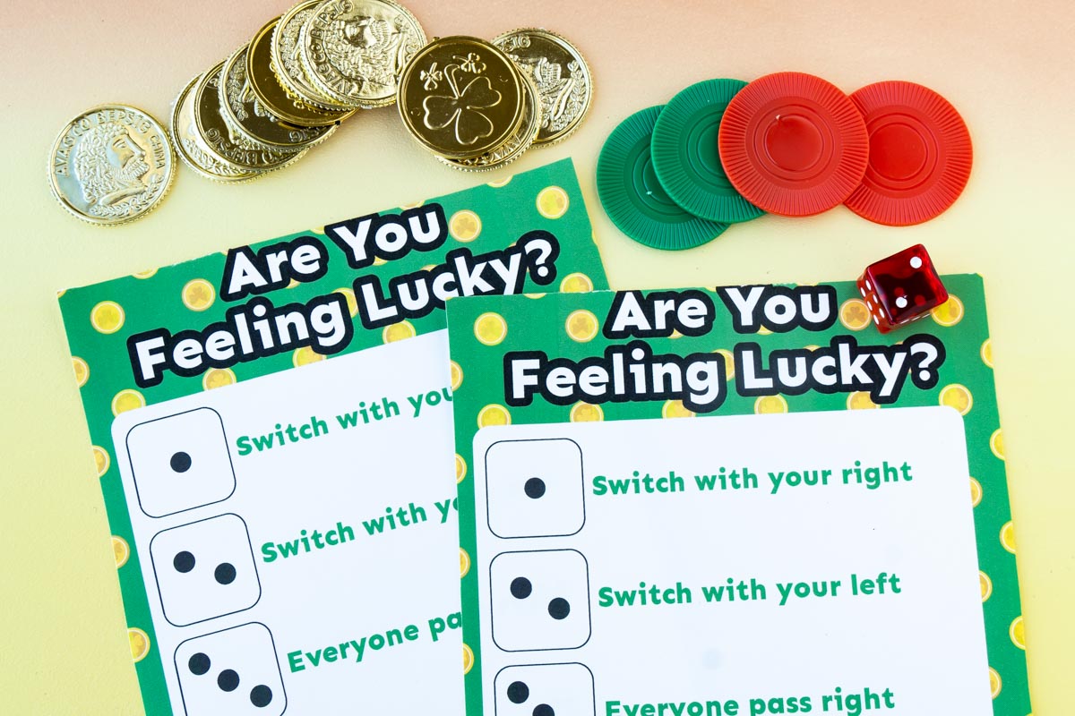 Printed out lucky dice game with colored coins