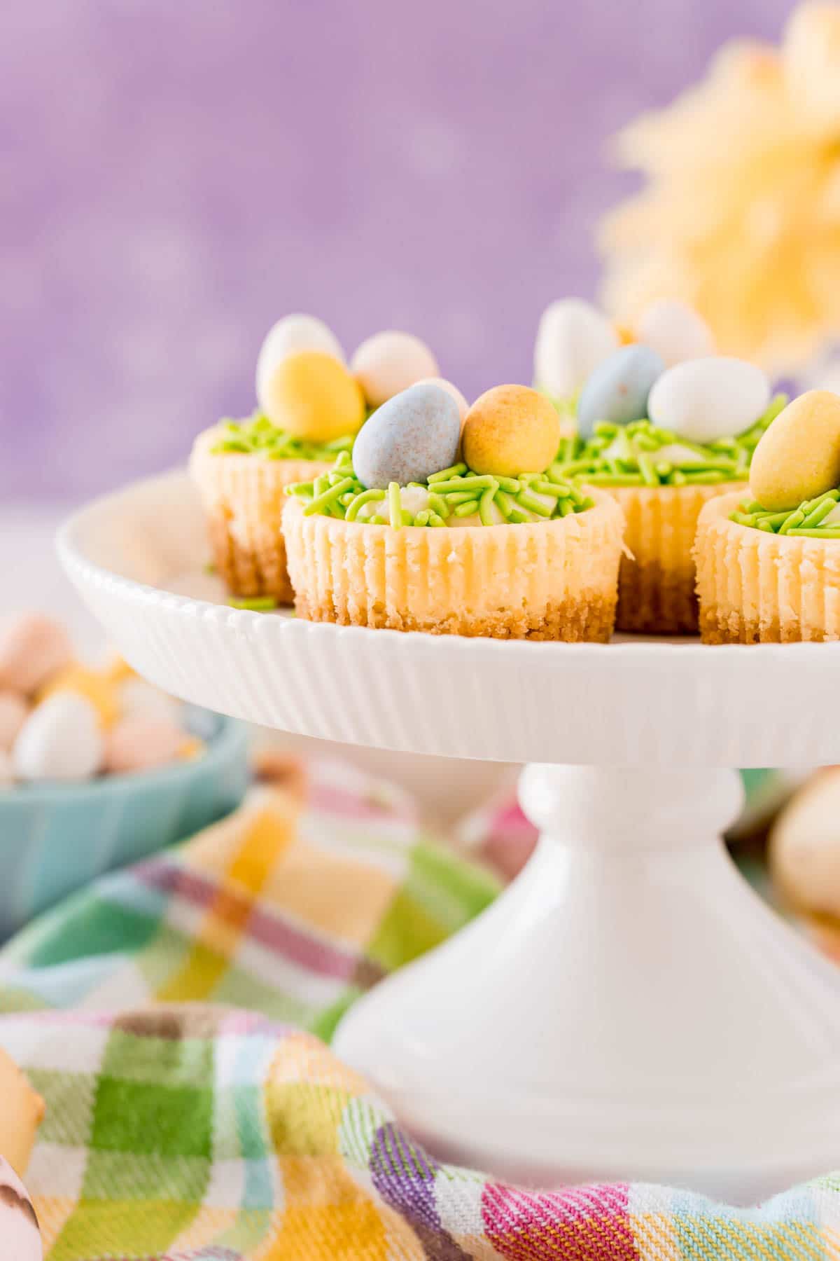 Cake stand full of mini egg cheesecake